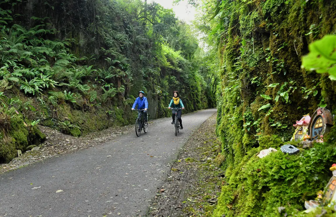 header couple exploring the Waterford Greenway